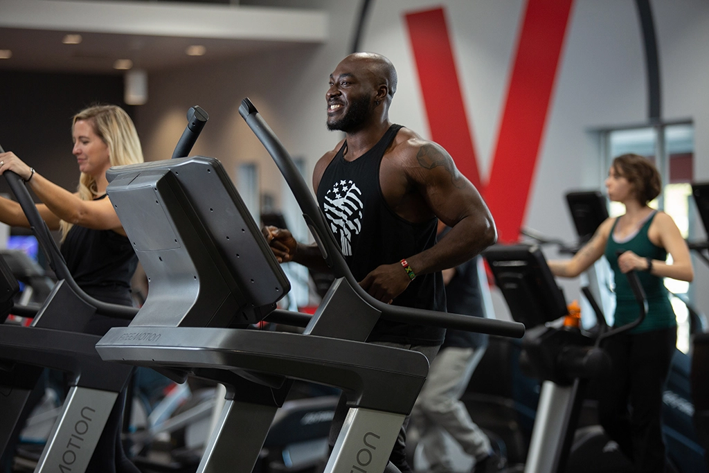 Male athlete at VASA Fitness running on a treadmill