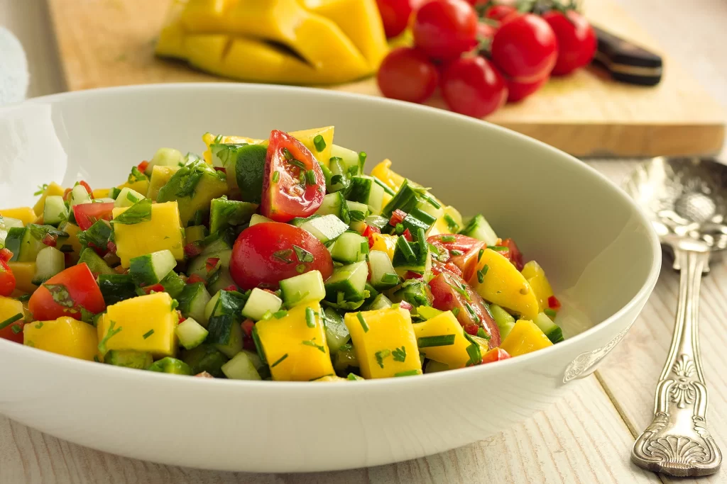 A mango salad with honey lime dressing